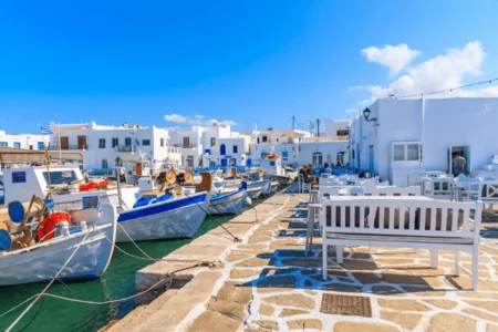 How can you get from Paros Port to Naoussa?